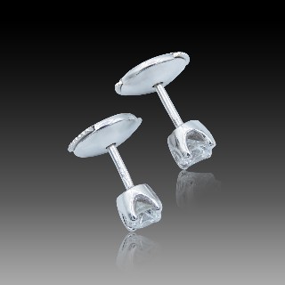 Puces d'oreilles or gris 18k avec 2 diamants de 0,18 Ct qualité G-VS. Puces d'oreilles or gris 18k avec 2 diamants de 0,18 Ct qualité G-VS.