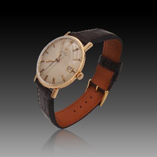 Montre Omega Vintage Automatique en Or rose 18k de 1964. 32-33 mm.