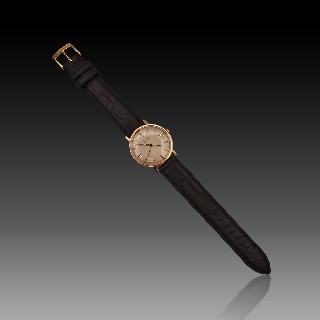 Montre Omega Vintage Automatique en Or rose 18k de 1964. 32-33 mm.