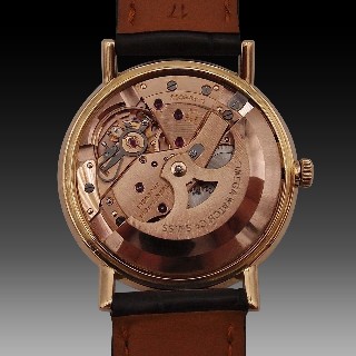 Montre Omega Vintage Automatique en Or rose 18k de 1964. 32-33 mm.