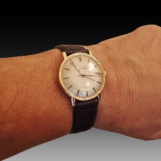 Montre Omega Vintage Automatique en Or rose 18k de 1964. 32-33 mm.