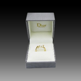Bague Dior "OUI" . Or jaune 18k de 2010 avec diamant . Taille 52.