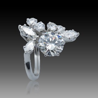 Bague en or gris 18k avec un Diamant brillant de 1.65 Cts Qualité G-VS2 + 1.0 Ct  G-VS.