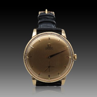 Montre Omega Vintage Automatique en Or rose 18k de 1960. 36 mm.