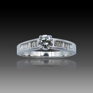 Solitaire Diamant brillant 0.36 Cts G-VS en Or 18 Cts + 0.25 Cts.