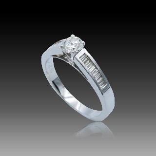 Solitaire Diamant brillant 0.36 Cts G-VS en Or 18 Cts + 0.25 Cts.