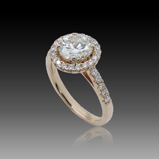 Solitaire en Or rose 18 Cts avec Diamant brillant 1.26 Cts J-SI1 + 0.35 Cts.