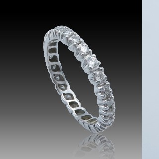 Alliance or gris 18K avec 0.75 Cts Diamants H-VS . Taille 55.