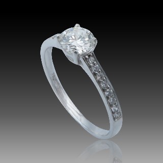 Solitaire Diamant brillant 0.41 Cts G-VS2 en Or 18 Cts + 0.13 Cts.