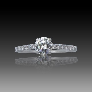 Solitaire Diamant brillant 0.49 Cts G-VS2 en Or 18 Cts + 0.12 Cts.