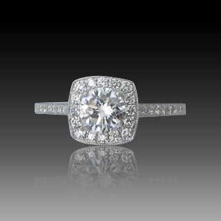 Solitaire Diamant brillant 0.58 Cts G-VVS2 en Or 18 Cts + 0.30 Cts.