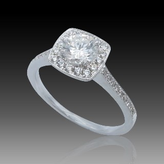 Solitaire Diamant brillant 0.58 Cts G-VVS2 en Or 18 Cts + 0.30 Cts.