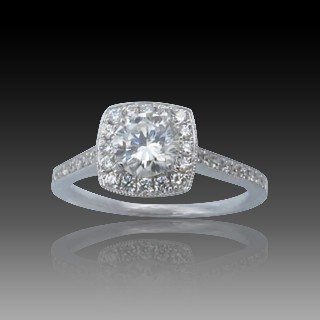 Solitaire Diamant brillant 0.58 Cts G-VVS2 en Or 18 Cts + 0.30 Cts.