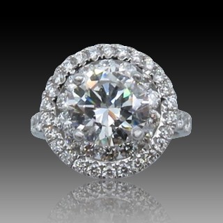 Solitaire en Or gris 18 Cts avec Diamant brillant 2.44 Cts F-VVS2 + 1.29 Cts.