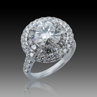 Solitaire en Or gris 18 Cts avec Diamant brillant 2.44 Cts F-VVS2 + 1.29 Cts.