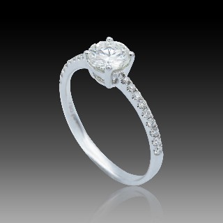 Solitaire Diamant brillant 0.67 Cts G-VS2 en Or 18 Cts + 0.16 Cts.