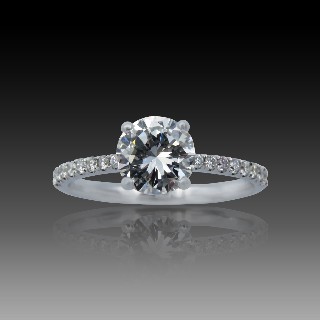 Solitaire Diamant brillant 1.06 Cts H-IF en Or 18 Cts + 0.17 Cts.