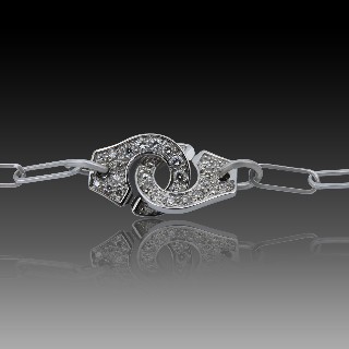 Bracelet Dinh Van Menottes R10  Or Gris 18 k et diamants .  