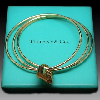 Bracelet Tiffany & Co "Triple"  en Or Jaune 18k. 35.80 gr