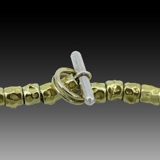 Bracelet DODO avec breloques en Or Jaune 18k et argent  30,30 gr