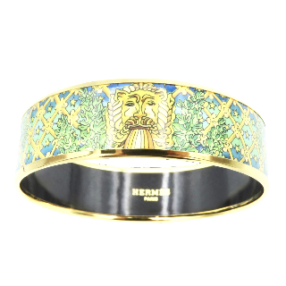 Bracelet Hermes en émail Imprimé Doré Prix Neuf : 470€. Moyen modèle