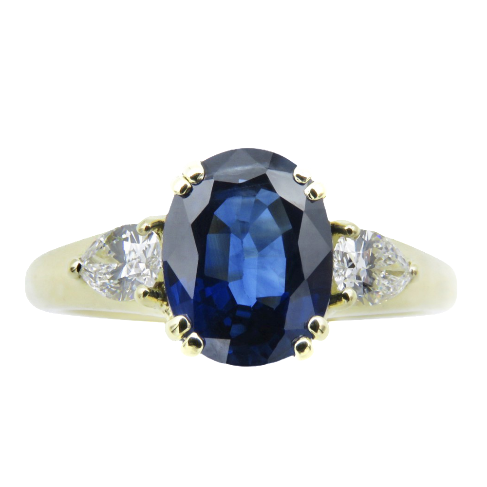 Bague en or jaune 18k avec saphir de Ceylan et diamants . Bague en or jaune 18k avec saphir de Ceylan et diamants .