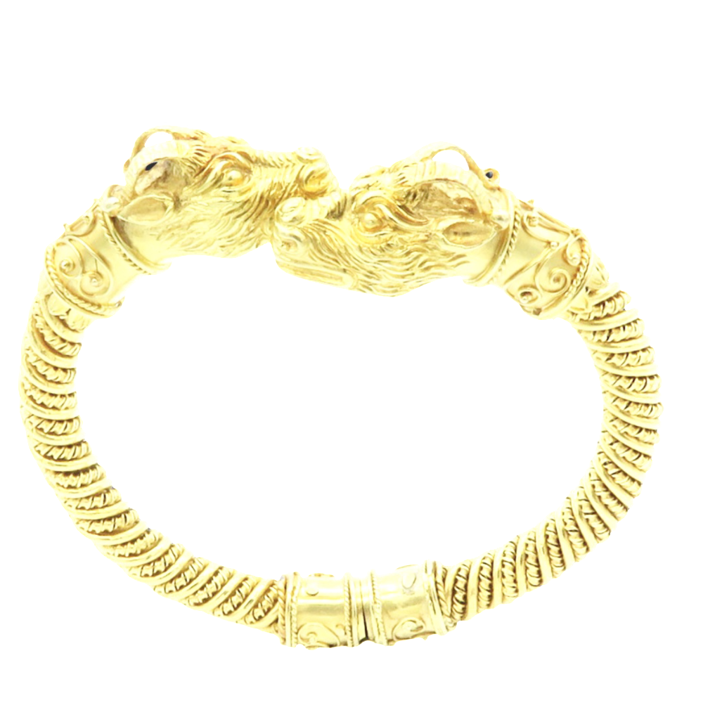 Bracelet jonc ouvrant ZOLOTAS "Têtes de Bélier" or jaune 18k . Poids : 94.50 Grs.