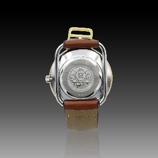 Montre Hermes  Dame "Arceau" Or et Acier . Quartz. 30 mm.