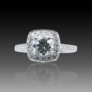 Solitaire Diamant brillant 0,76 Cts I-VS2 en Or 18 Cts + 0.30 Cts.