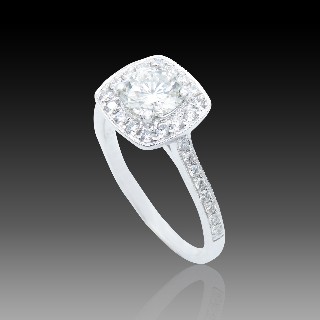 Solitaire Diamant brillant 0,76 Cts I-VS2 en Or 18 Cts + 0.30 Cts.