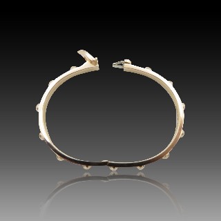 Bracelet jonc ouvrant Vuitton "Clou" or rose 18k . Poids : 31,20 Grs.Taille 16