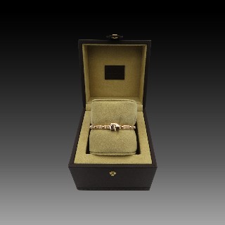 Bracelet jonc ouvrant Vuitton "Clou" or rose 18k . Poids : 31,20 Grs.Taille 16