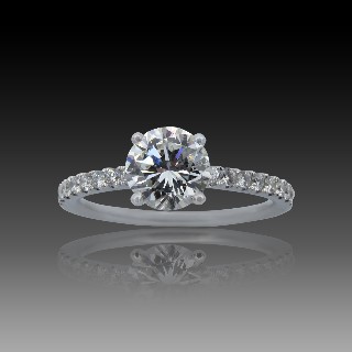 Solitaire Diamant brillant 1.05 Cts G-VVS1 en Or 18 Cts + 0.21 Cts.