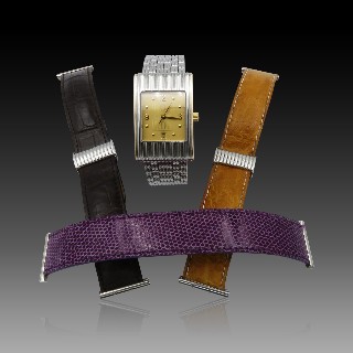 Montre Boucheron "Reflet" Homme taille L en Or et Acier à quartz . Montre Boucheron "Reflet" Homme taille L en Or et Acier à quartz .