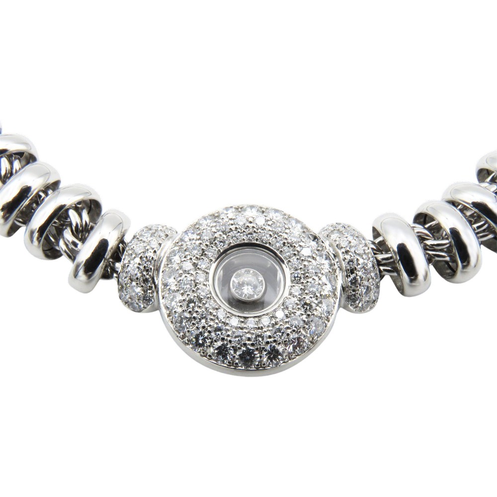 Collier Pendentif Chopard "Happy Diamonds" en or gris 18k et diamants brillants.