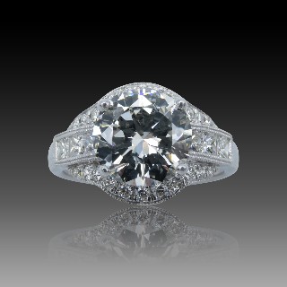 Solitaire en Or gris 18 Cts avec Diamant brillant 3.22 Cts H-SI2 + 0.74 Cts.