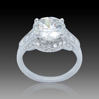 Solitaire en Or gris 18 Cts avec Diamant brillant 3.22 Cts H-SI2 + 0.74 Cts.