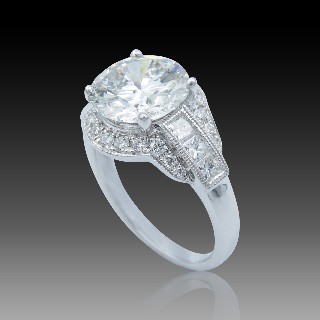 Solitaire en Or gris 18 Cts avec Diamant brillant 3.22 Cts H-SI2 + 0.74 Cts.