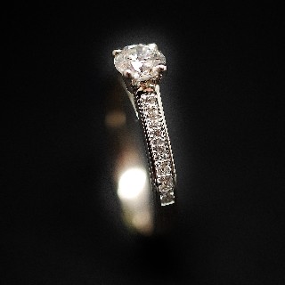 Solitaire Diamant brillant 0.50 Cts G-SI en Or 18 Cts + 0.35 Cts.