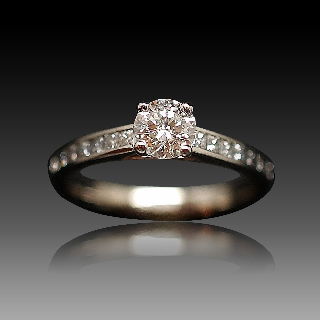 Solitaire Diamant brillant 0.50 Cts G-SI en Or 18 Cts + 0.35 Cts.