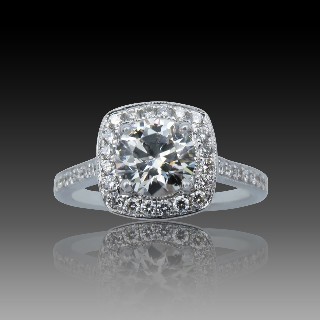 Solitaire Diamant brillant 1.04 Cts G-SI1 en Or 18 Cts + 0.32 Cts.