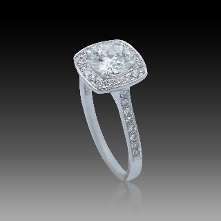 Solitaire Diamant brillant 1.04 Cts G-SI1 en Or 18 Cts + 0.32 Cts.