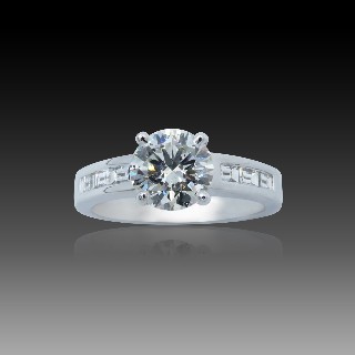 Solitaire en Or gris 18 Cts avec Diamant brillant 1.60 Cts I-SI2 + 0.31 Cts.