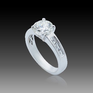 Solitaire en Or gris 18 Cts avec Diamant brillant 1.60 Cts I-SI2 + 0.31 Cts.