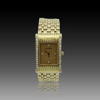 Montre Boucheron Reflet Dame Médium en Or Jaune 18k avec diamants quartz .