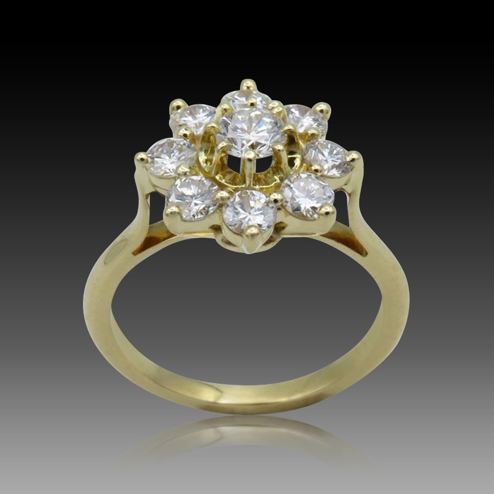 Bague entourage Or jaune 18K avec Diamants. Vers 2000. Taille 51