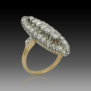 Grande Bague "Marquise" or jaune, platine et diamants total : 2 cts , vers 1910