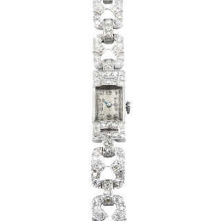 Montre dame Art Déco en platine avec 2,50 Cts de diamants . Montre dame Art Déco en platine avec 2,50 Cts de diamants .