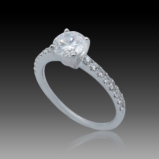 Solitaire en Or gris 18 Cts avec Diamant brillant 0.72 Cts D-VS1 + 0.21 Cts.