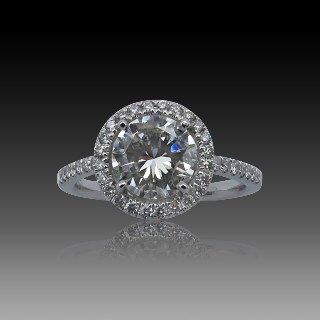 Solitaire en Or gris 18 Cts avec Diamant brillant 1,24 Cts G-SI1 + 0,28 Cts